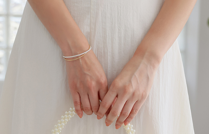 Pearl layered Gold Cross bracelet